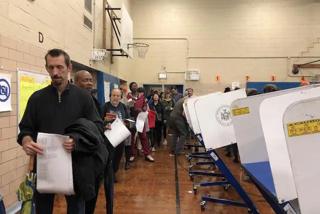 Voters waited in line to scan their ballots at a polling site in Clinton Hill Brooklyn on Election Day in 2018.